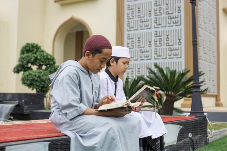 Muslim brothers reading Quran
