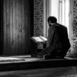a man offering his night prayer and doing dhikr during his Qiyam-ul-Layl
