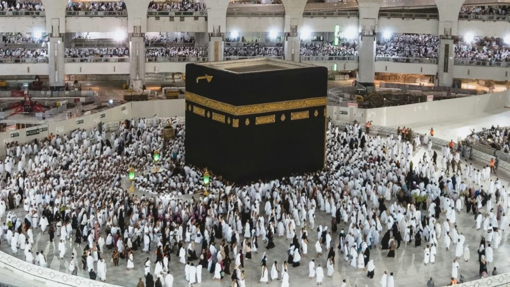 Masjid al-Haram with Pilgrims Peacefully Circling the Kaaba - A Rare Moment of Serenity with Lesser Crowds.